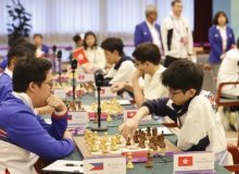 SCMP: Hong Kong teen Kao chasing chess master status after historic victory in Spain tournament